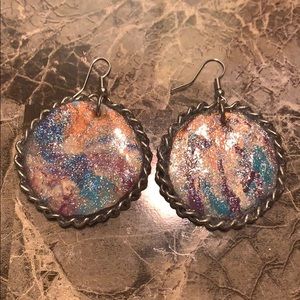 Handmade earrings made using acrylic pours.
